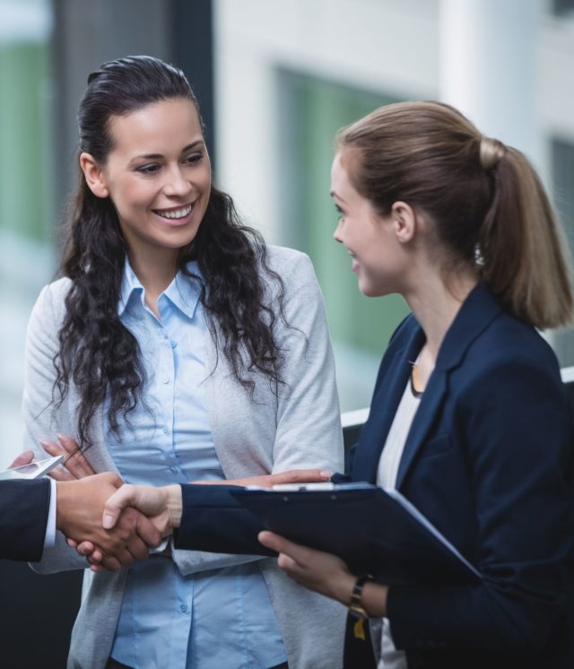 businesspeople-having-discussion-office-1